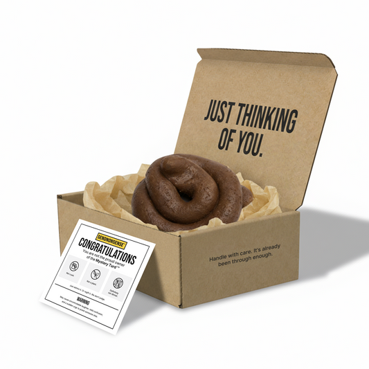 Funny gag gift box labeled “Just Thinking of You,” featuring a realistic fake poop called the “Mystery Turd.”