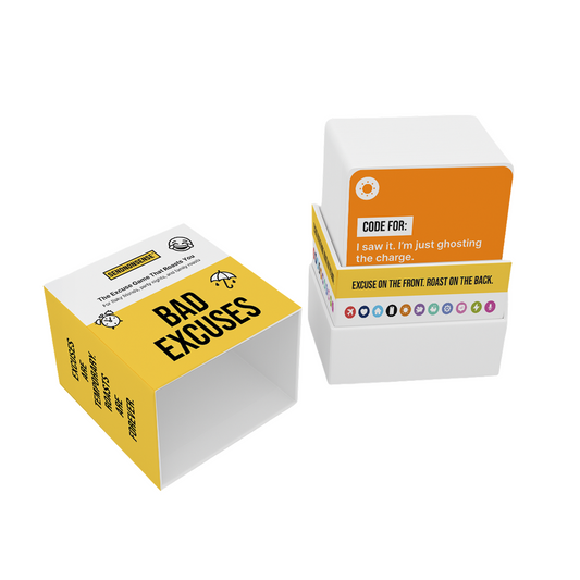 SendNonsense Bad Excuses game box and cards. The yellow and white box reads ‘Bad Excuses – The Excuse Game That Roasts You.’ A stack of cards is shown beside it with one card reading ‘CODE FOR: I saw it. I’m just ghosting the charge.’ Text on the side says ‘Excuse on the front. Roast on the back.’ Perfect for SendNonsense fans looking for a funny excuse card game gift.